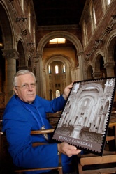 The Dean of Belfast with the stamp featuring St Anne's Cathedral when it was first issues last year.
